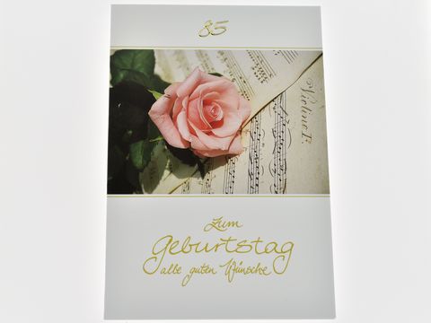 Geburtstagskarte - Rosafarbende Rose auf Notenpapier
