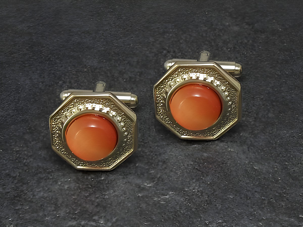 Goldfarbene Manschettenknöpfe mit orangefarbenem Design, Durchmesser 18,2 mm, von Juwelier Harnisch, elegant und stilvoll, perfekt für besondere Anlässe.