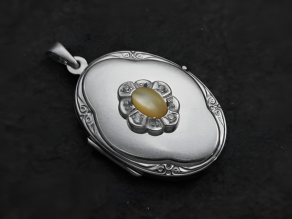 Perlmutt natur Medaillon Cabochon in Weißgold 333 mit Brillanten, elegant gefertigt vom Juwelier Harnisch, verleiht dem Schmuckstück eine edle und zeitlose Ausstrahlung.