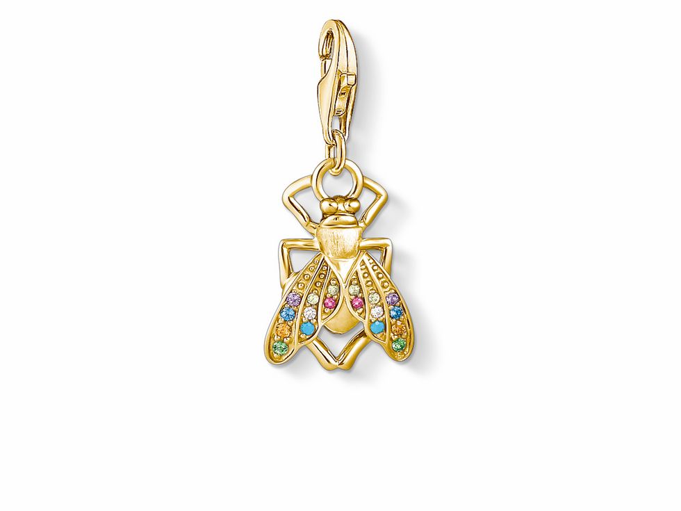 Fliege Charm-Anhänger von Thomas Sabo aus vergoldetem Sterling Silber mit bunten Zirkonia-Steinen, detailreich gestaltet und ideal für individuelle Schmuckstücke.