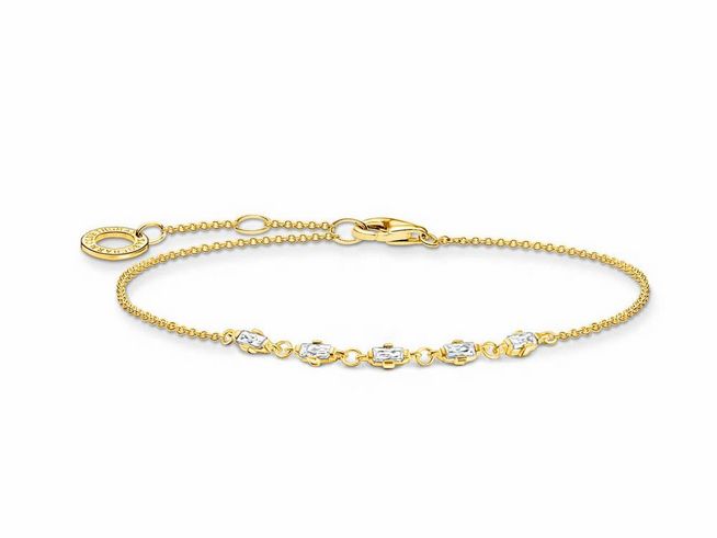Thomas Sabo Charming Armband aus Sterling Silber mit vergoldeter Oberfläche und weißen Zirkonia, elegante Kette mit drei glitzernden Elementen, verstellbar von 16 bis 19 cm.