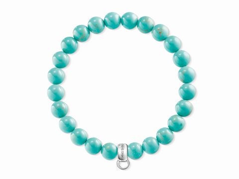 Charm-Armband von Thomas Sabo in türkis mit einer Länge von 16,5 cm, passende Erweiterung bis 18 cm, hergestellt aus hochwertigen Materialien und elegantem Design.