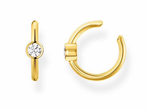 Ohrklemme aus dem Thomas Sabo Charming Collection, aus Silber mit gelbgoldener Beschichtung, verziert mit klarem Zirkonia, elegantes Design für modernen Ohrschmuck.