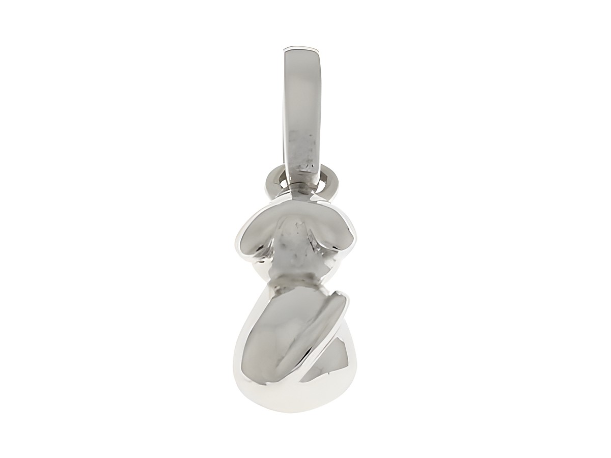Ein Anhänger in Form eines Hundes, Rückansicht, aus silber rhodiniertem Material, Hersteller Juwelier Harnisch, für Tierliebhaber geeignet.