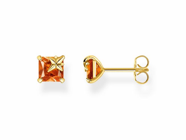 Ohrstecker von Thomas Sabo aus Sterling Silber in vergoldetem Gelbgold mit einem orangen Glas-Keramik Stein in quadratischer Form. Ideal für elegante Anlässe.