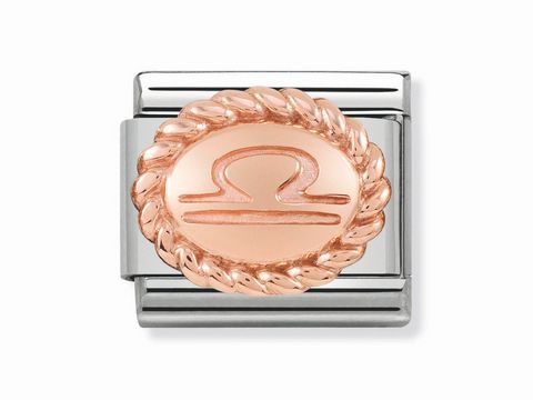Classic Waage Sternzeichen OVAL in Rosé von Nomination, mit einem stilisierten Waagesymbol in der Mitte und einer eleganten, geflochtenen Rahmenstruktur.