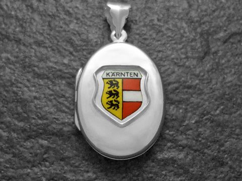 Silbernes Medaillon mit dem Stadtwappen von Kärnten, feine Details und farbige Embleme, Hersteller Juwelier Harnisch, ideal für Sammler und als Schmuckstück.