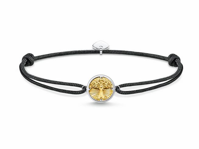 Silbernes Armband von Thomas Sabo mit vergoldetem Lebensbaum-Anhänger und schwarzem Nylonband, verstellbar von 16 bis 27 cm, elegant und modern.