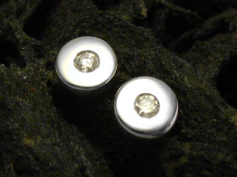 49004-0 Elegante Ohrringe aus 585 Weißgold mit Diamanten, gefertigt vom Juwelier Harnisch, exquisite Verarbeitung und zeitloses Design, perfekt für besondere Anlässe und den Alltag.