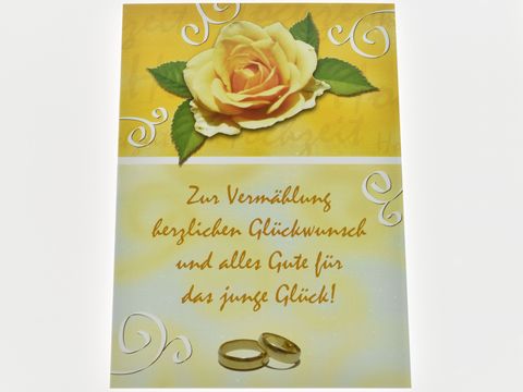 Hochzeitskarte mit gelber Rose und buntem Hintergrund. Text zur Vermählung mit Glückwünschen und zwei Eheringen am unteren Rand. Hersteller Juwelier Harnisch.