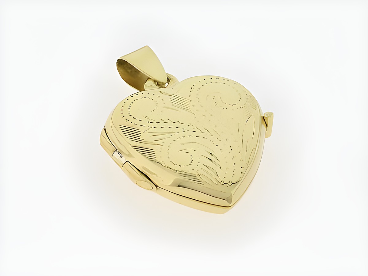 Silber Medaillon in Herzform, silber vergoldet mit floralen Verzierungen, Hersteller: Juwelier Harnisch, elegantes Design in Gelbgold. Ideal als besonderes Schmuckstück.