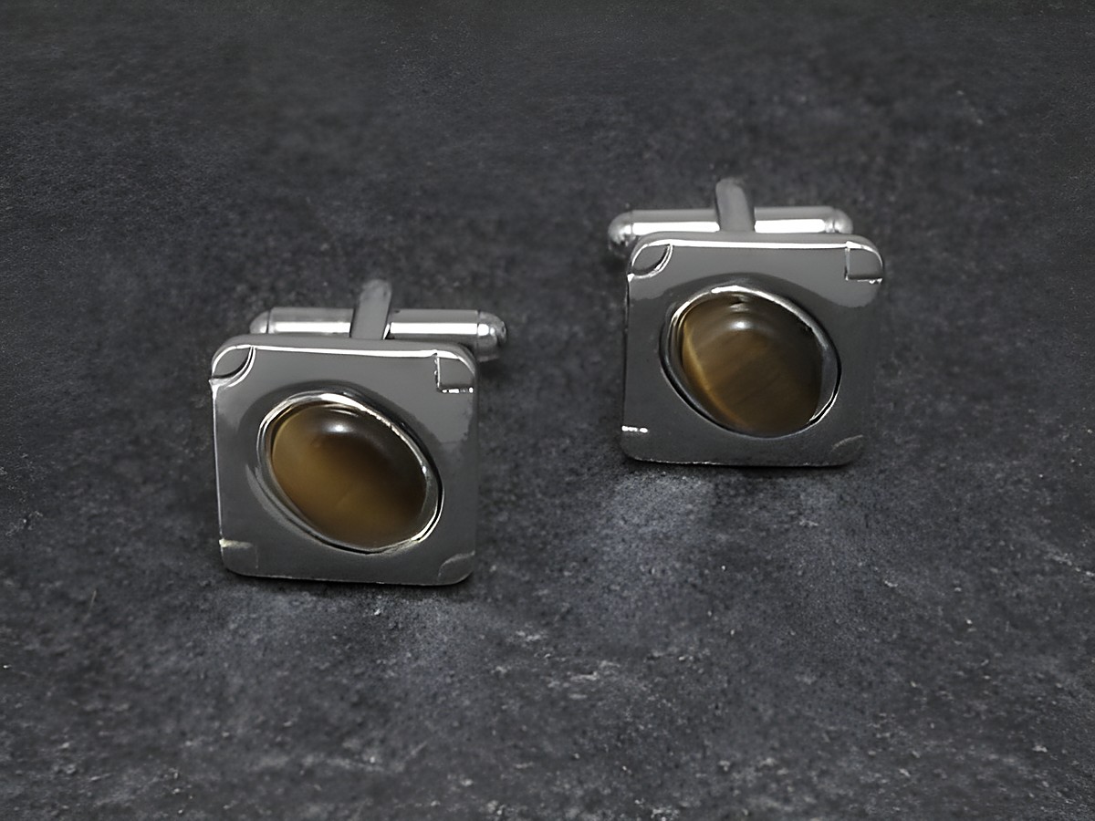 Manschettenknöpfe in braunem Design mit einem Durchmesser von 16,4 mm, silberfarben, Hersteller Juwelier Harnisch, ideal für elegante Anlässe.