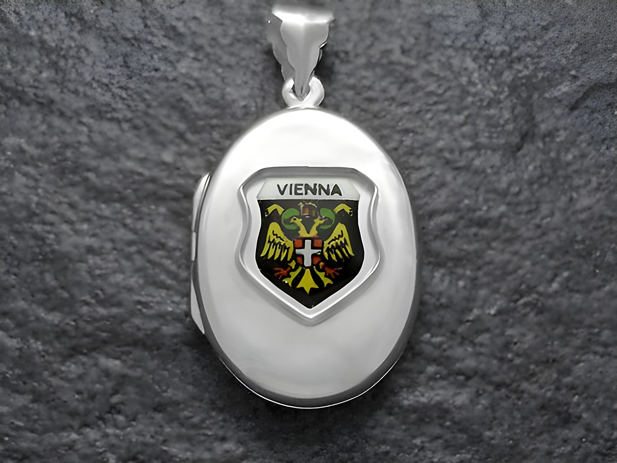 Silber Medaillon mit dem Wappen von Wien, das eine detailreiche Darstellung des Stadtwappens zeigt, hergestellt von Juwelier Harnisch, ideal für Sammler und als Geschenk.