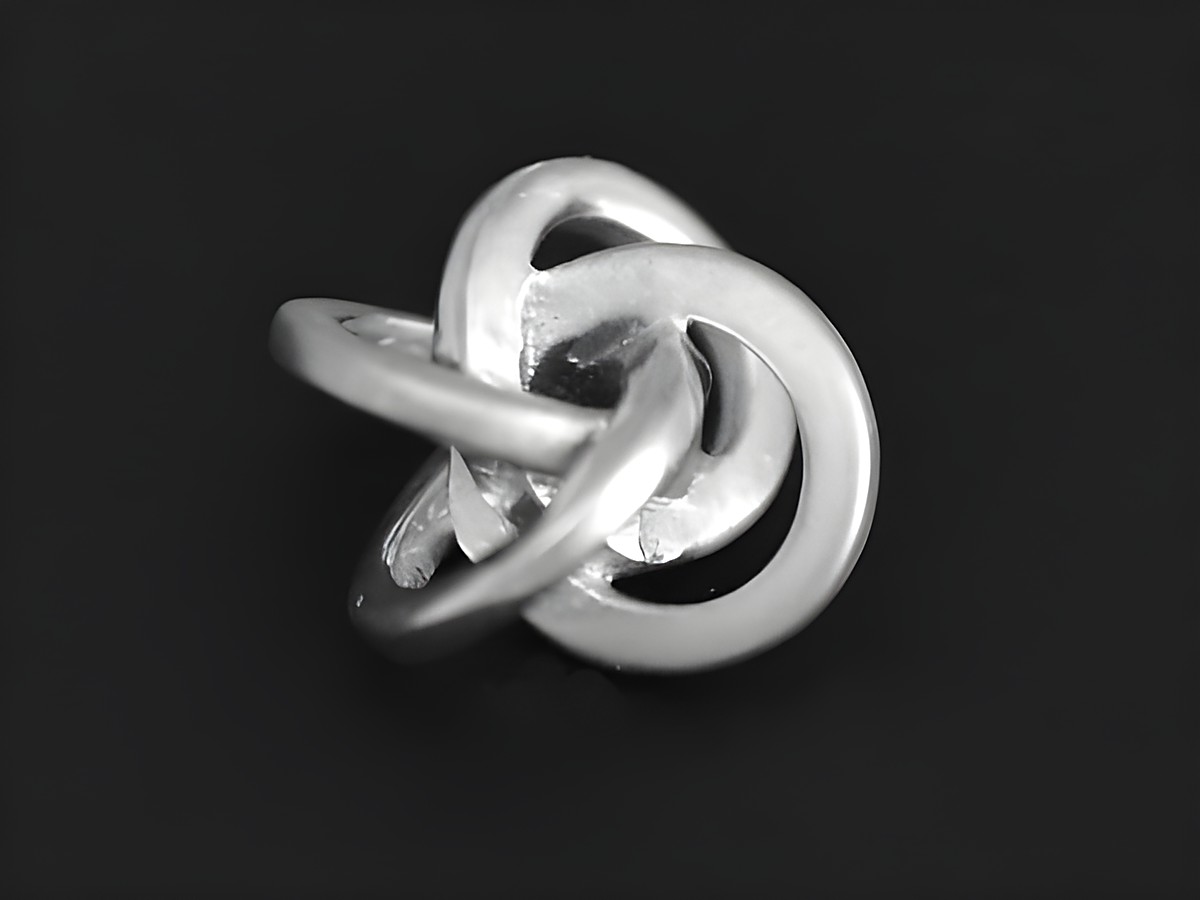 Silber Anhänger in verschlungenem Design, rhodiniert, Hersteller Juwelier Harnisch, elegantes Schmuckstück für besondere Anlässe.