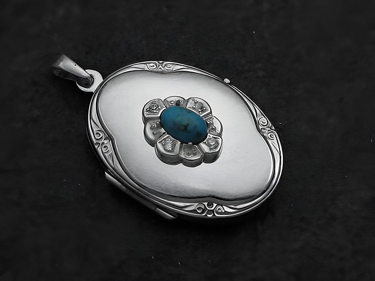 Türkis Medaillon Cabochon in Sterling Silber mit Brillanten, Hersteller Juwelier Harnisch, stilvolles Design mit floralen Details und glänzender Oberfläche.