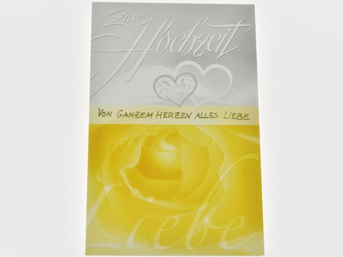 Hochzeitkarte mit Rosenblüte und Herzen, von Juwelier Harnisch, mit dem Schriftzug zur Hochzeit und dem Text von ganzem Herzen alles Liebe in eleganter Schrift.
