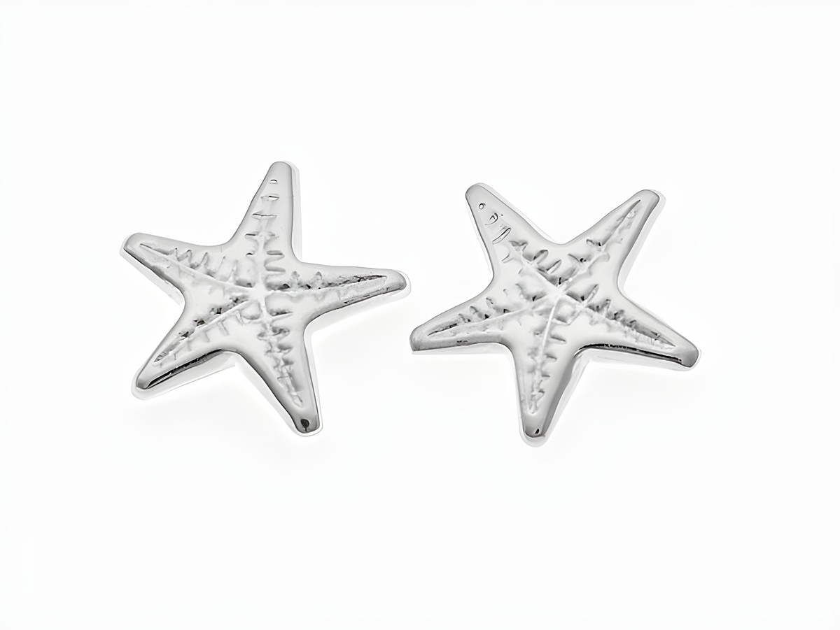 Ohrringe Seestern aus Silber 925, fabelhaft designte Ohrstecker ohne Stein, stilvoll und perfekt für den maritimen Look, Hersteller Juwelier Harnisch.
