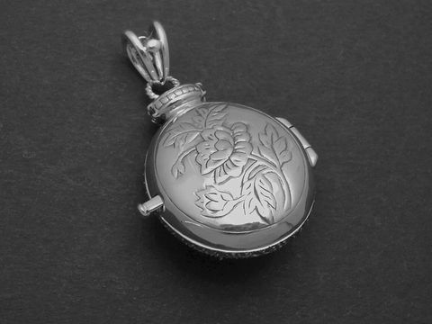 Medaillon Peridot königlich nostalgisch aus Sterling Silber von Juwelier Harnisch, rund mit feiner Blumengravur, ideal als Schmuckstück oder für besondere Anlässe.