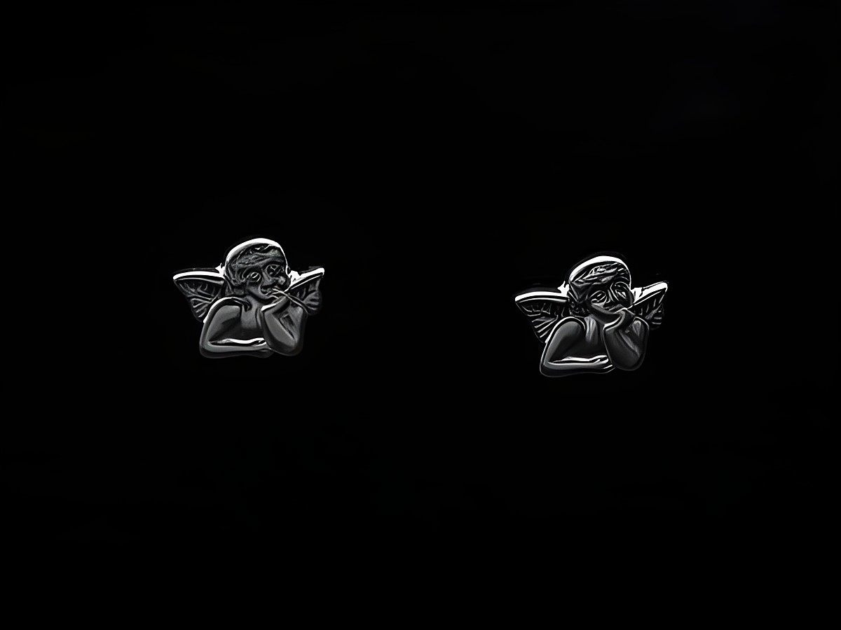 Engel Ohrringe aus Sterling Silber in Form von Schutzengeln, hergestellt von Juwelier Harnisch, ideal für Kinder. Die Ohrringe zeigen detailreiche Engel mit Flügeln.