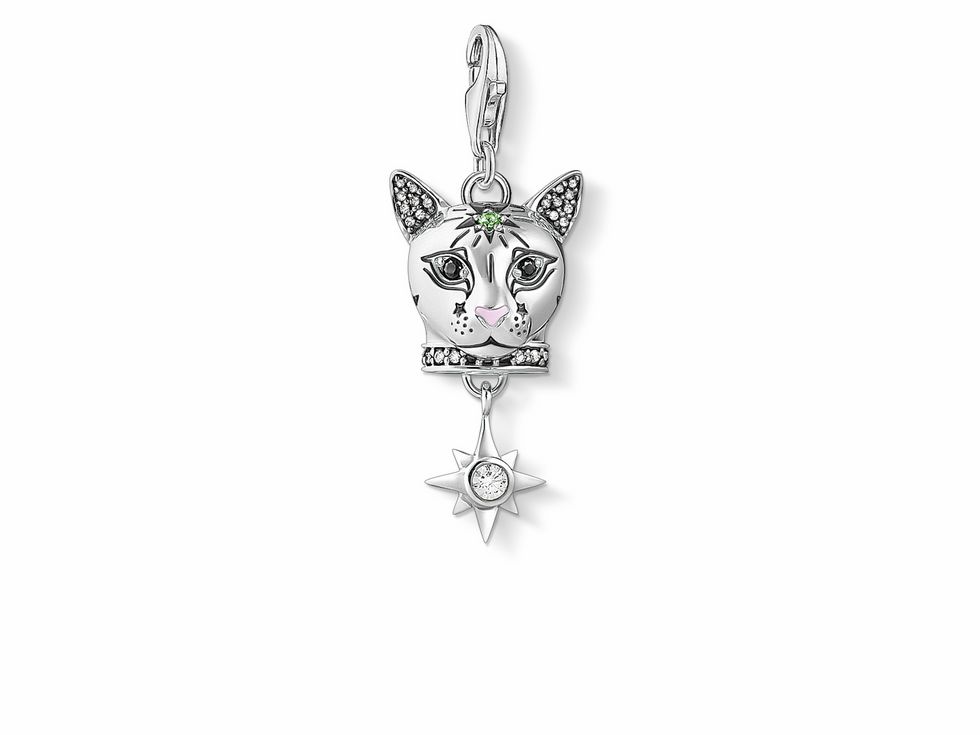 Charm-Anhänger von Thomas Sabo in Form einer Katze aus Sterling Silber, verziert mit Zirkonia in verschiedenen Farben und einem hängenden Stern mit funkelndem Stein.