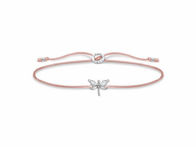 Ein elegantes Thomas Sabo Armband aus Sterling Silber und Nylon mit einem bezaubernden Schmetterlingsmotiv aus Zirkonia in Beige, verstellbar von 13 bis 20 cm.