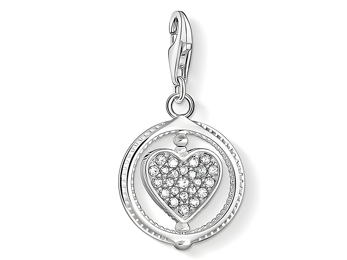 Charm von Thomas Sabo aus Silber mit Zirkonia in Herzform, umgeben von einem runden, glatten Rahmen, ideal als Ausdruck von Liebe und Zuneigung.