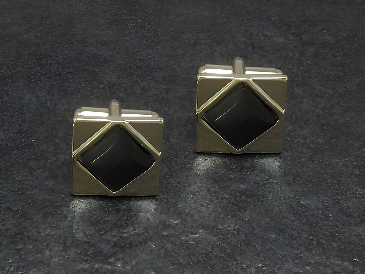 Manschettenknöpfe in grau mit goldfarbenem Design, Größe 16,5 mm, elegant und stilvoll, Hersteller Juwelier Harnisch, ideal für formelle Anlässe.