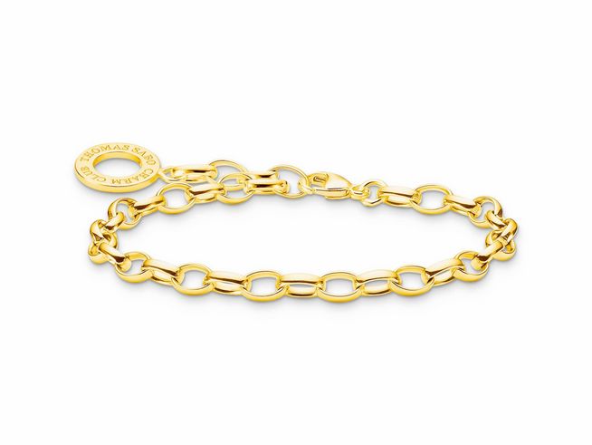 Charm Armband von Thomas Sabo aus vergoldetem Silber 750, Länge 19,5 cm, mit auffälligen Gliedern und einer runden Anhängerplakette mit eingraviertem Markenlogo.