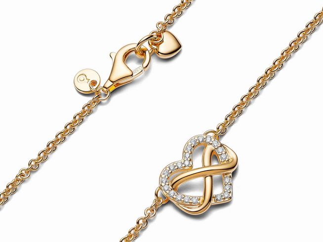 Funkelnde Unendlichkeit-Herz Collier-Halskette von Pandora mit gelbgold vergoldeter Kette und klaren Zirkonia, 50 cm lang, eleganter Verschluss und stilvolles Design.