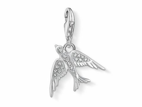 Schöner Thomas Sabo Charm in Form einer Schwalbe, aus Silber mit funkelnden Zirkonia, ideal für Tierliebhaber und Schmuckfans, elegantes Design.