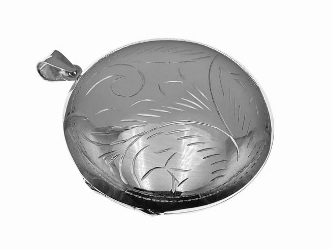 Rundes silbernes Medaillon mit floralem Muster, Hersteller Juwelier Harnisch, elegant gestaltet und hochwertig verarbeitet. Ideal als persönliches Schmuckstück oder Geschenk.