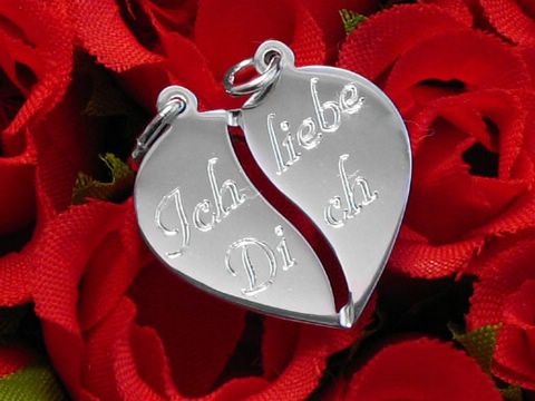 Herz Partneranhänger aus Silber mit der eingravierten Botschaft Ich liebe dich, geteilt in zwei Hälften, ideal für Freundschaft und Partnerschaft, Hersteller Juwelier Harnisch.