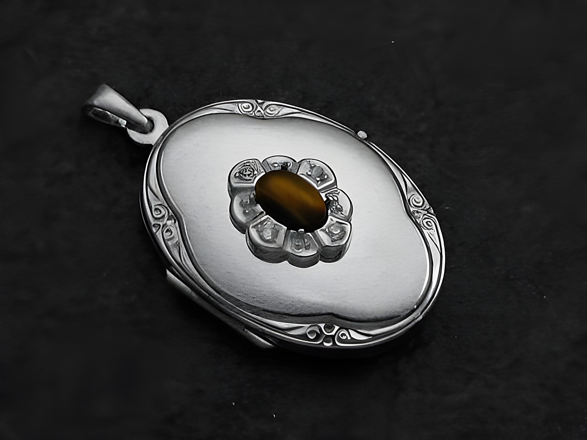 Medaillon aus Sterling Silber mit Tigerauge Cabochon und Zirkonia, gefertigt vom Juwelier Harnisch, zeigt eine ovale Form mit feinem Design. Ideal als elegantes Schmuckstück.