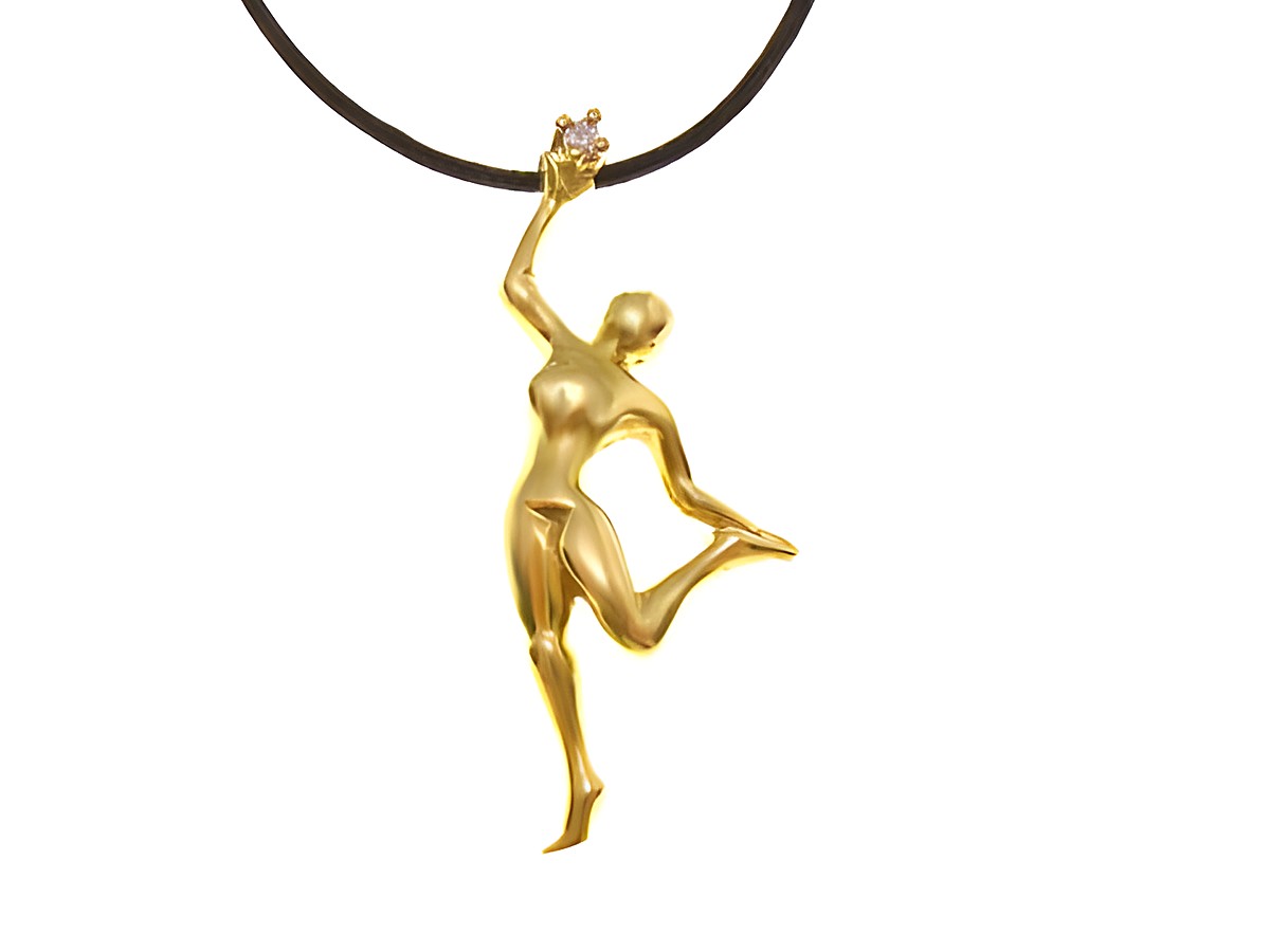 Ballerina als Goldanhänger mit Diamant von Juwelier Harnisch, dargestellt in lebendiger Tanzpose, ideal als elegantes Schmuckstück für Ballettliebhaber.