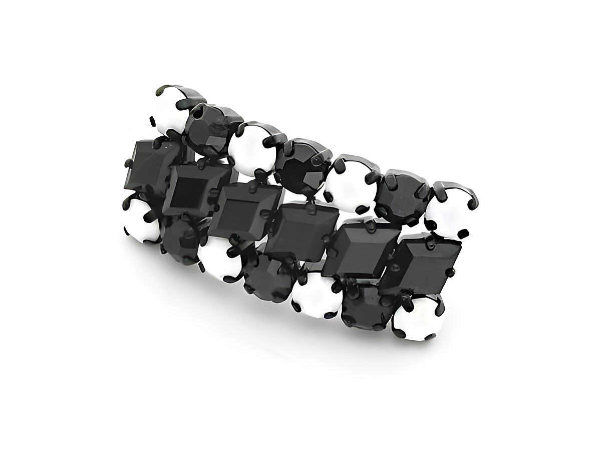 Strass Brosche in Weiß und Schwarz, länglich gefasst, hergestellt von Juwelier Harnisch. Die Brosche verleiht jedem Outfit einen eleganten Akzent und ist ideal für besondere Anlässe.
