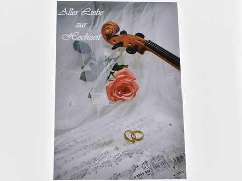 Hochzeitskarte mit Schleier, Ringen, Rose, Violine und Noten, Hersteller Juwelier Harnisch, ideal für Hochzeitsgrüße und romantische Anlässe.