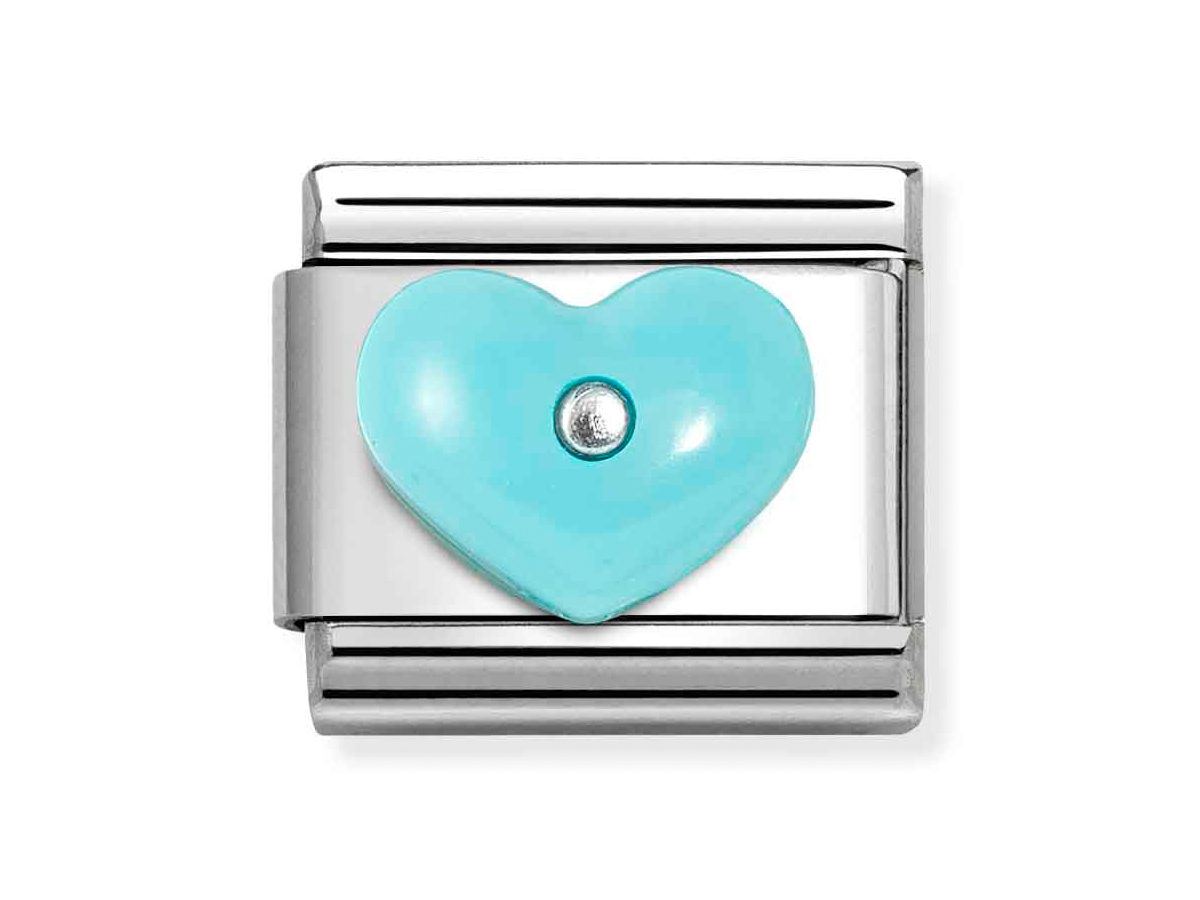 Nomination Sterling Silber 330509 16 - Herz - Harz + Türkis Element - Classic Silber Ein Herz aus Türkis-Harz mit einem silbernen Element umrahmt von einem klassischen Silberband, geeignet für die Nomination Sterling Silber 330509 16 Kollektion.
