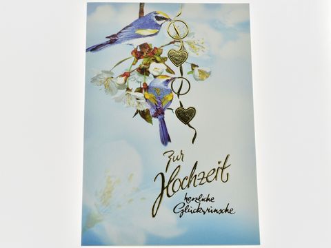 Hochzeitskarte mit zwei Vögeln auf einem Blumenzweig, darunter hängende Herzen und der Schriftzug zur Hochzeit, Hersteller Juwelier Harnisch.