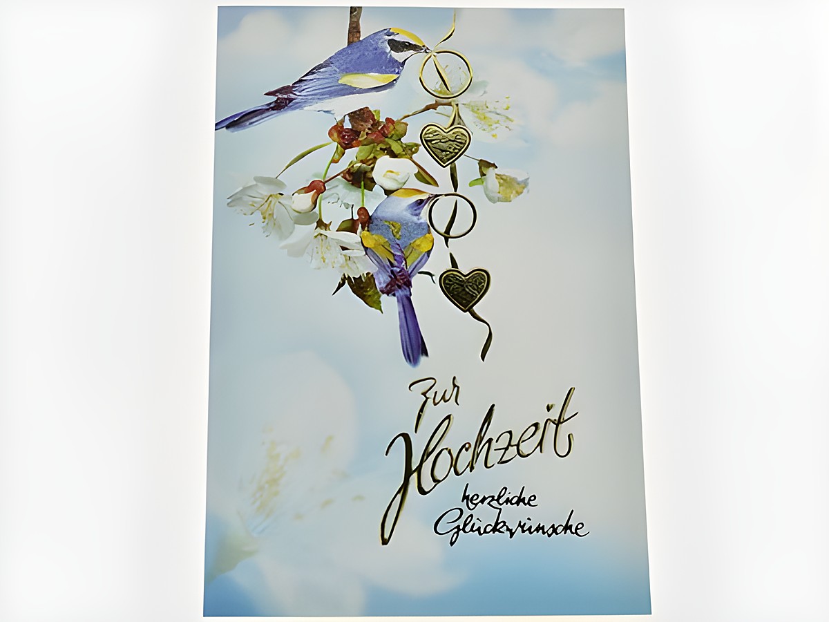 Hochzeitskarte mit zwei Vögeln auf einem Blumenzweig, darunter hängende Herzen und der Schriftzug zur Hochzeit, Hersteller Juwelier Harnisch.