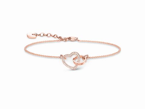 Silber rosé Armband von Thomas Sabo mit Verzierung in Herzform, Details mit funkelnden Steinen, verstellbar für Handgelenke von 16 bis 19 cm.