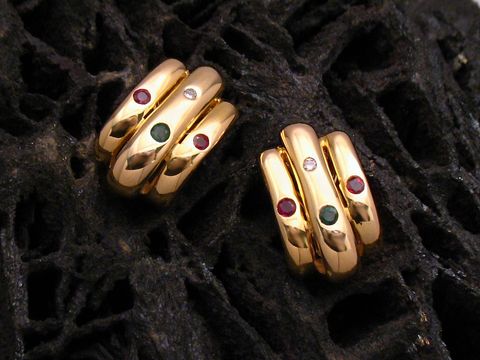 Ohrclip aus Gold 585 mit Brillant 0,02 ct sowie Rubin und Smaragd, elegant designt und ideal für besondere Anlässe, Hersteller Juwelier Harnisch.