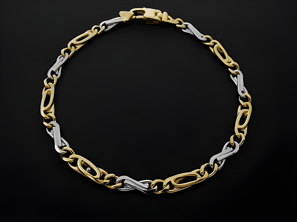 Armband Designmuster in Gold 750 bicolor mit einer Breite von 4 x 1,8 mm und einer Länge von 19 cm vom Hersteller Juwelier Harnisch, Gold 585, elegant und zeitlos.
