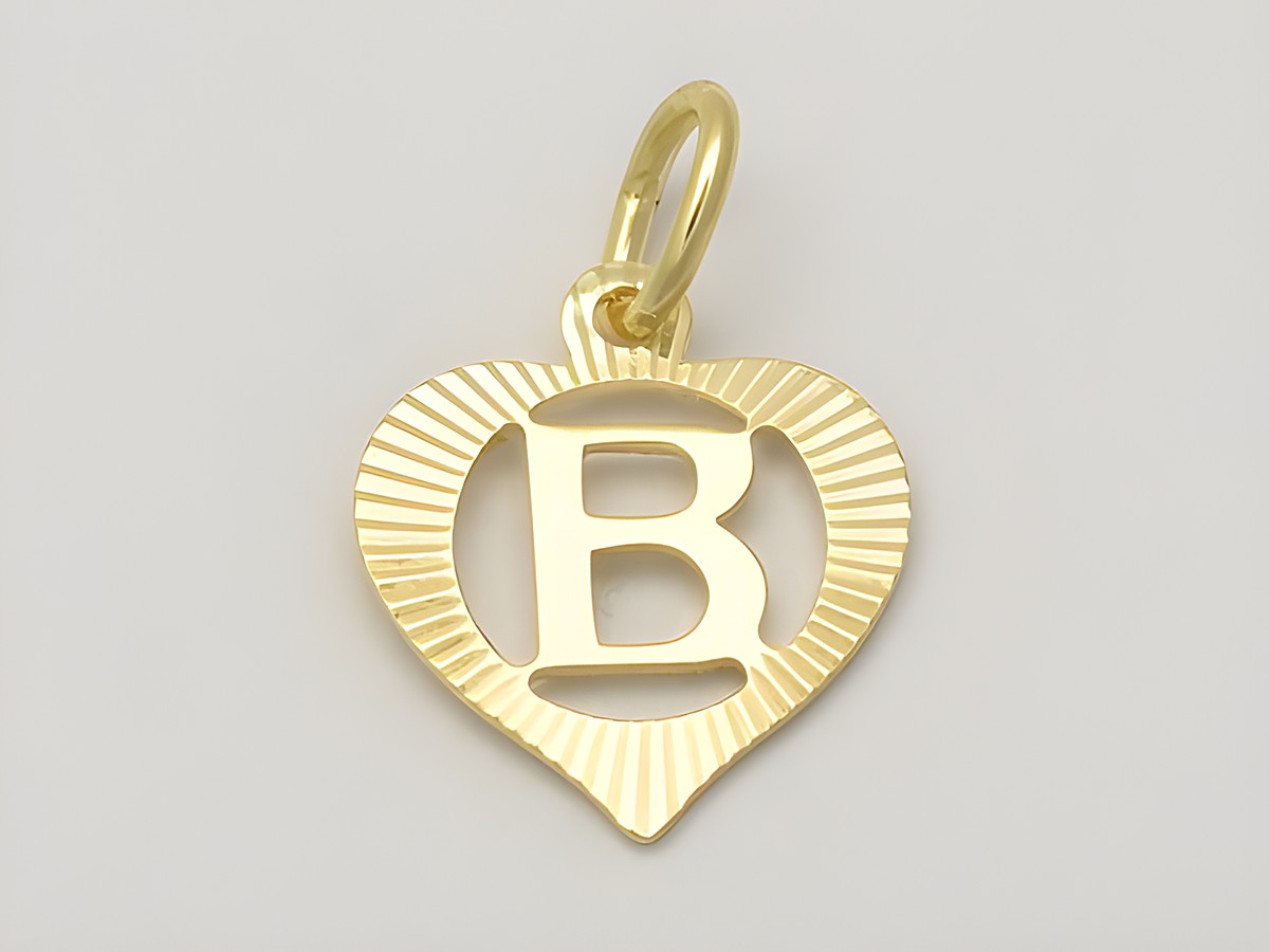 Herz Anhänger mit dem Buchstaben B aus 333 Gold, diamantiert, hergestellt von Juwelier Harnisch, elegantes Design für besonderen Schmuck.