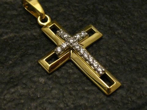 Gold Anhänger mit Zirkonia in Form eines Kreuzes aus Gold 333, Hersteller Juwelier Harnisch, verziert mit funkelnden Steinen, ideal als Schmuckstück für besondere Anlässe.