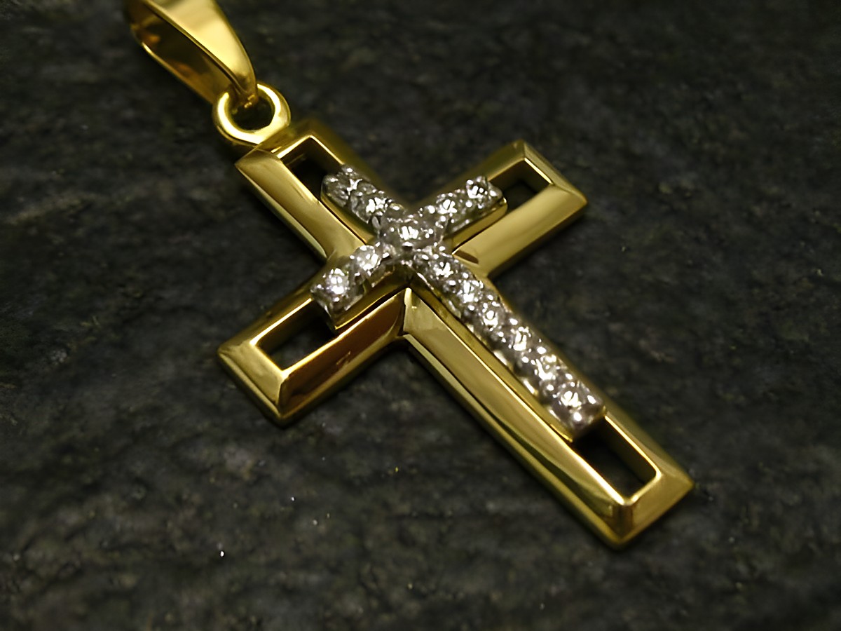 Gold Anhänger mit Zirkonia in Form eines Kreuzes aus Gold 333, Hersteller Juwelier Harnisch, verziert mit funkelnden Steinen, ideal als Schmuckstück für besondere Anlässe.