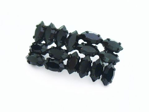 Schwarze Strass Brosche im sexy City Look mit funkelnden, eleganten schwarzen Steinen, ideal für stilvolle Akzente. Hersteller: Juwelier Harnisch, perfekt für jedes Outfit.