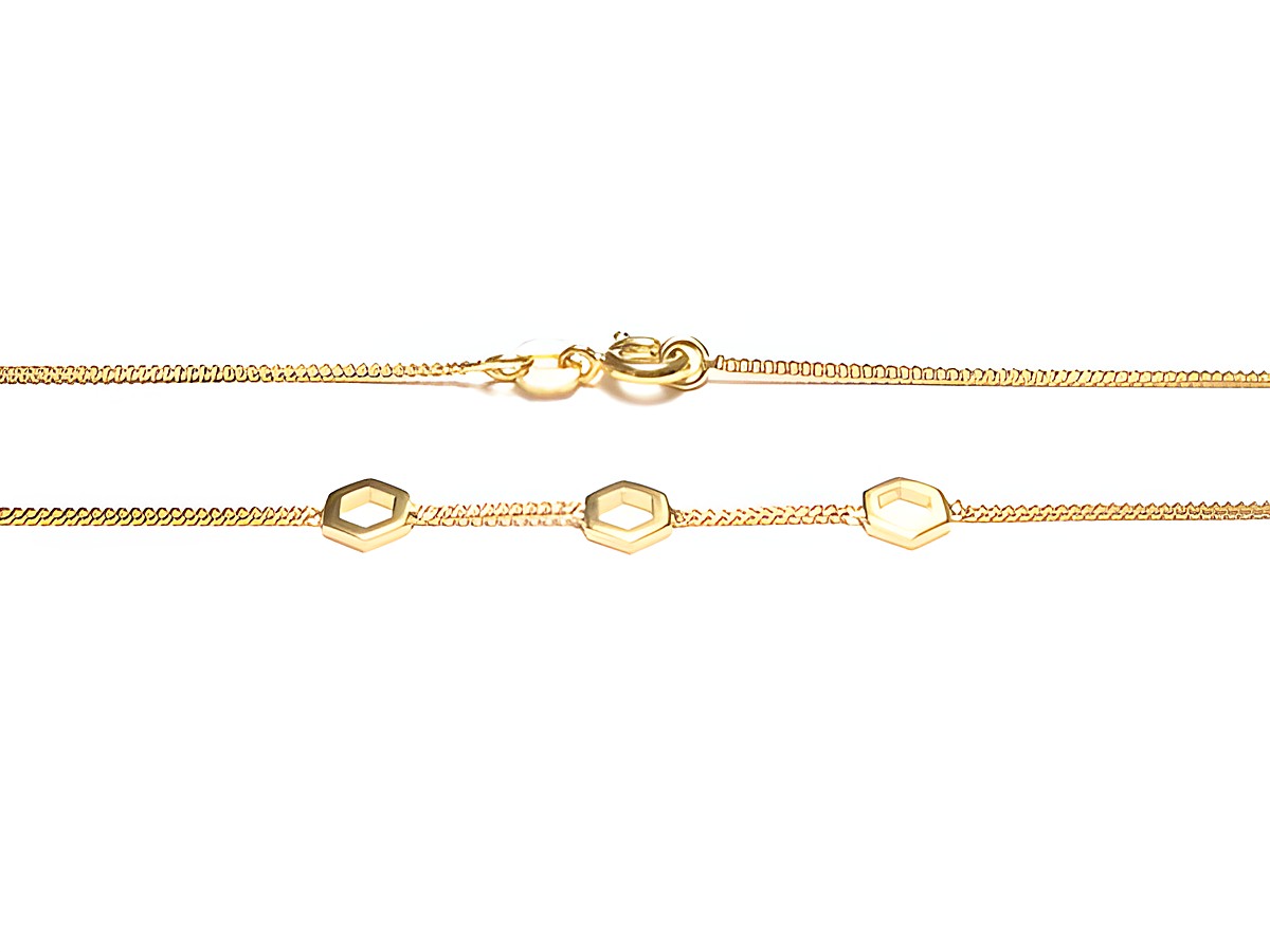 Kette aus Gold auf Silber mit Designer-Elementen von Juwelier Harnisch, 40 cm lang, verziert mit hexagonalen Anhängern, elegante und moderne Ausstrahlung.