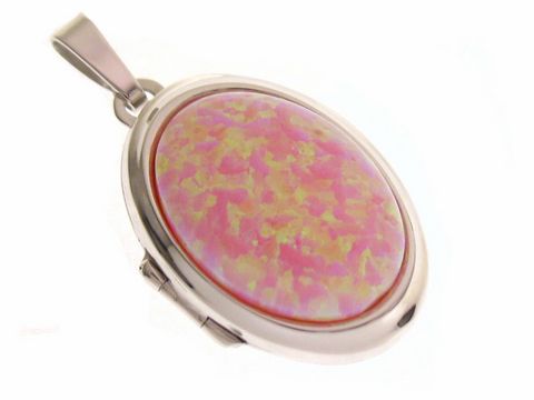 Ein ovales Medaillon aus rhodiniertem Sterling Silber mit einem cabochonförmigen opal rosa Stein, der durch seine leuchtenden Farben besticht und eleganten Schmuck ausstrahlt.