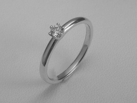 Verlobungsring aus 585 Weißgold mit einem Brillanten von 0,10 ct in W/Si, Größe 60. Hersteller ist Juwelier Harnisch, ideal für romantische Anlässe.