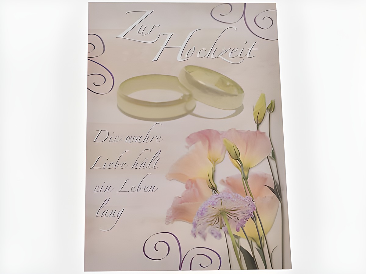 Hochzeitskarte in rose mit Trauringen und floralen Motiven, beschriftet mit Zur Hochzeit und der Aussage Die wahre Liebe hält ein Leben lang, Hersteller Juwelier Harnisch.